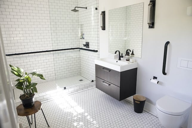 ada compliant in law suite bathroom in classic subway tile