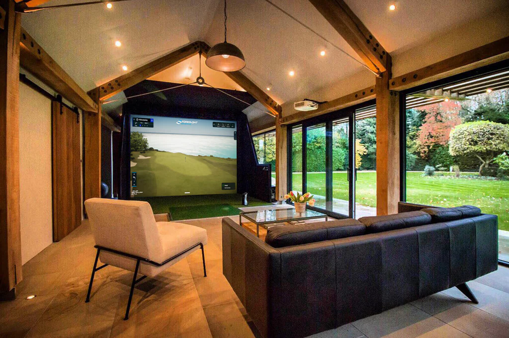 golf simulator shed in a backyard