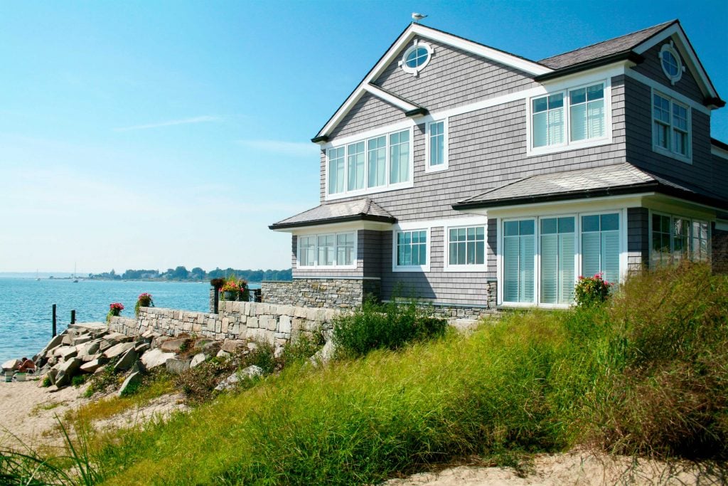 classic coastal grey siding on hamptons home