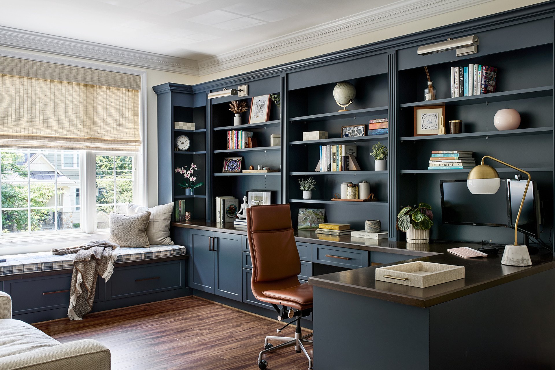 dramatic dark home office with custom built-ins