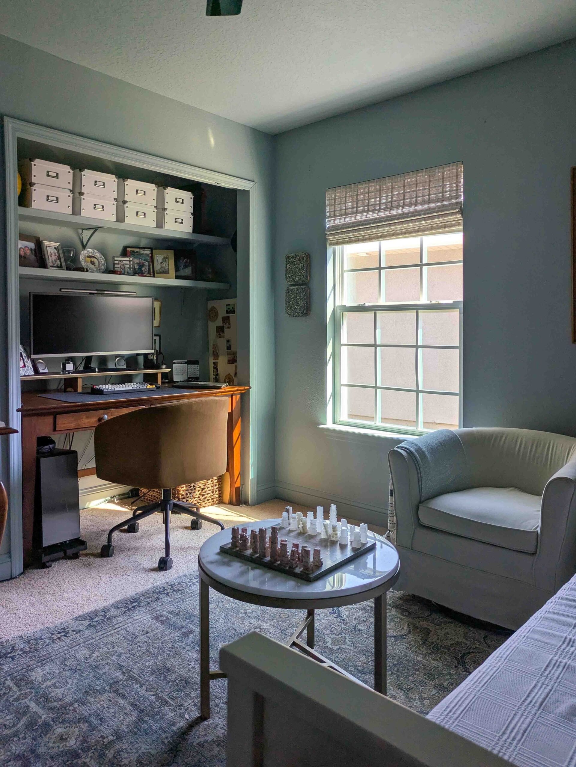 guest room with egress window and pullout couch